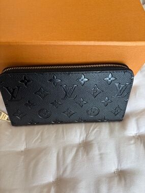 Fashionable Black Embossed Monogram Zip Wallet